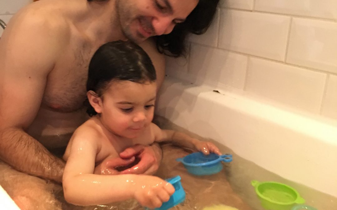 Bath fun with daddy